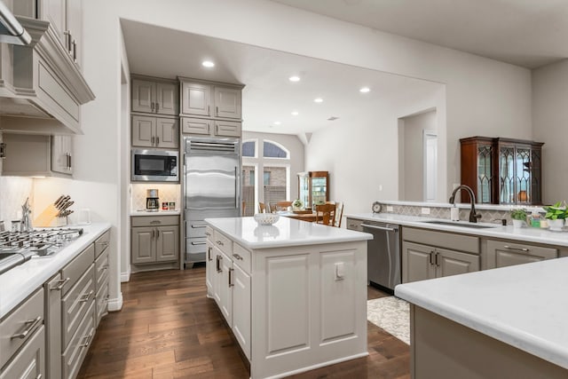 28911 Ally Lynn Way, Katy, TX 77494 - kitchen featuring built in appliances, a sink, gray cabinetry, decorative backsplash, and recessed lighting