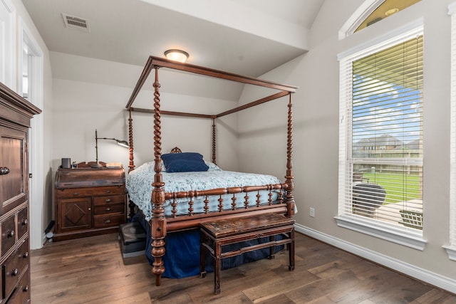 28911 Ally Lynn Way, Katy, TX 77494 - bedroom featuring wood finished floors, vaulted ceiling, and baseboards