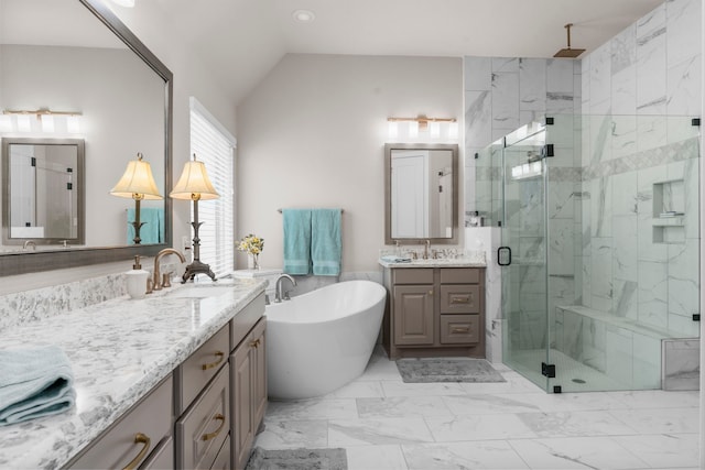 28911 Ally Lynn Way, Katy, TX 77494 - full bath featuring a marble finish shower, vanity, a freestanding tub, marble look tiles, and lofted ceiling