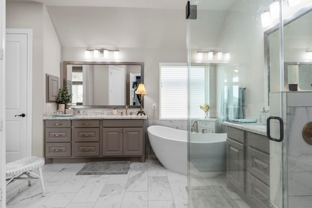 28911 Ally Lynn Way, Katy, TX 77494 - bathroom featuring vanity, a soaking tub, a stall shower, and marble look tiles