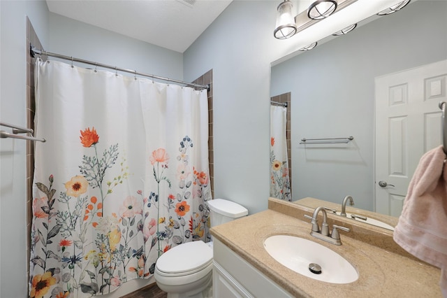 19202 Indigo Lake Dr, Magnolia, TX 77355 - bathroom featuring toilet, vanity, and curtained shower