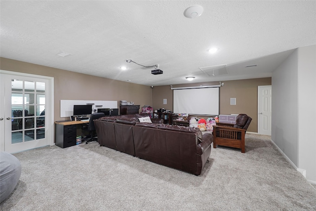 19202 Indigo Lake Dr, Magnolia, TX 77355 - living room with light colored carpet, a textured ceiling, and an office area