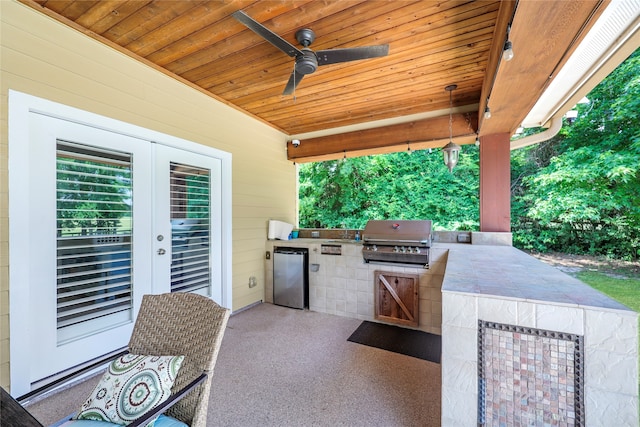 19202 Indigo Lake Dr, Magnolia, TX 77355 - view of patio / terrace with french doors, a ceiling fan, and a sink