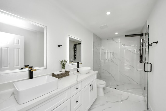 22718 Carter Moir Ln, Katy, TX 77449 - full bath with marble look tile flooring, recessed lighting, a marble finish shower, double vanity, and toilet