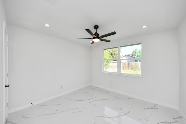 22718 Carter Moir Ln, Katy, TX 77449 - empty room featuring baseboards, marble finish flooring, recessed lighting, and ceiling fan