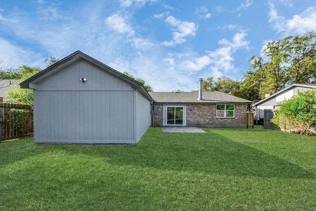 22718 Carter Moir Ln, Katy, TX 77449 - rear view of house with a shingled roof