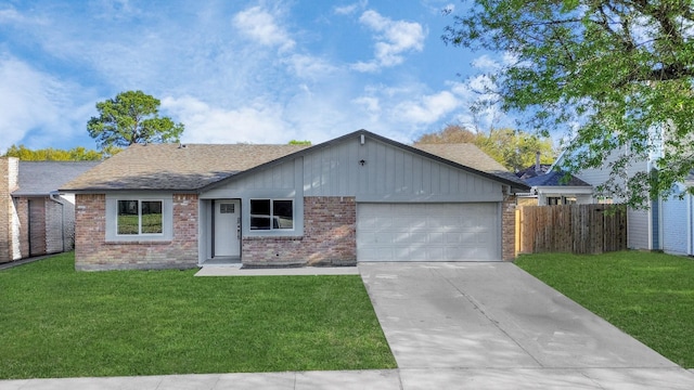 22718 Carter Moir Ln, Katy, TX 77449 - ranch-style home with a garage, brick siding, driveway, a shingled roof, and board and batten siding