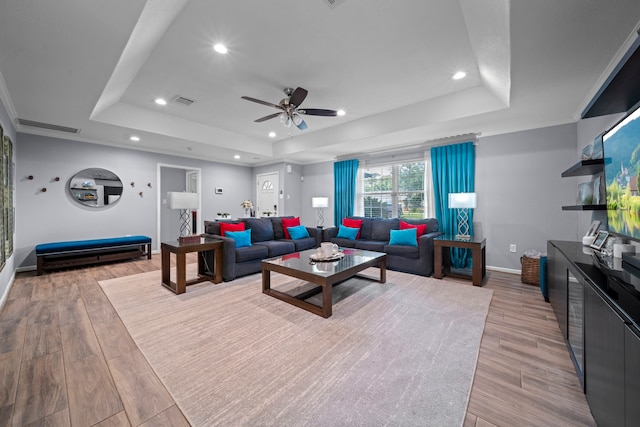 3010 Helberg Rd, Houston, TX 77092 - living area with a raised ceiling, a ceiling fan, baseboards, recessed lighting, and light wood finished floors