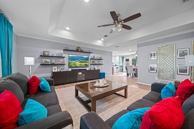 3010 Helberg Rd, Houston, TX 77092 - living room with wood finished floors, a ceiling fan, recessed lighting, a tray ceiling, and baseboards