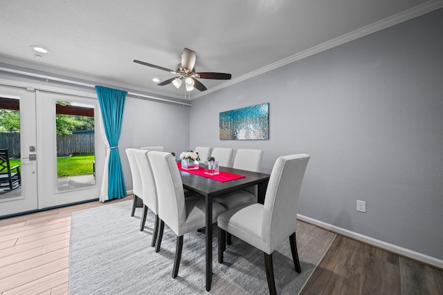 3010 Helberg Rd, Houston, TX 77092 - dining room with wood finished floors, ornamental molding, french doors, a ceiling fan, and baseboards