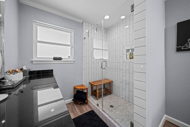 3010 Helberg Rd, Houston, TX 77092 - full bathroom with a shower stall, crown molding, wood finished floors, and baseboards