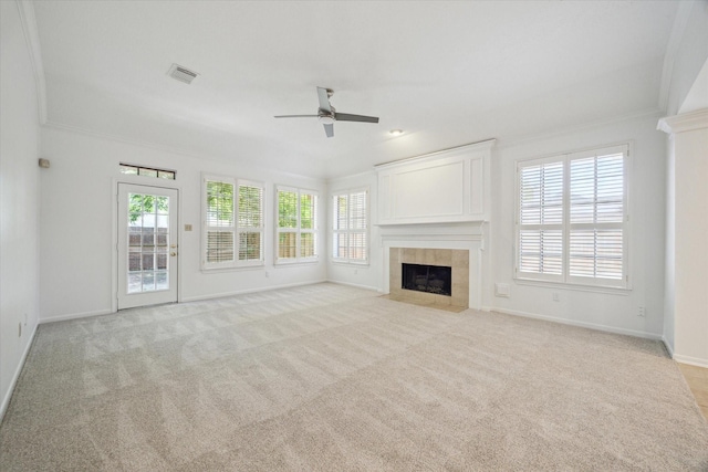 14507 Sycamore Lake Rd, Houston, TX 77062 - unfurnished living room featuring ceiling fan, a tile fireplace, baseboards, light colored carpet, and ornamental molding