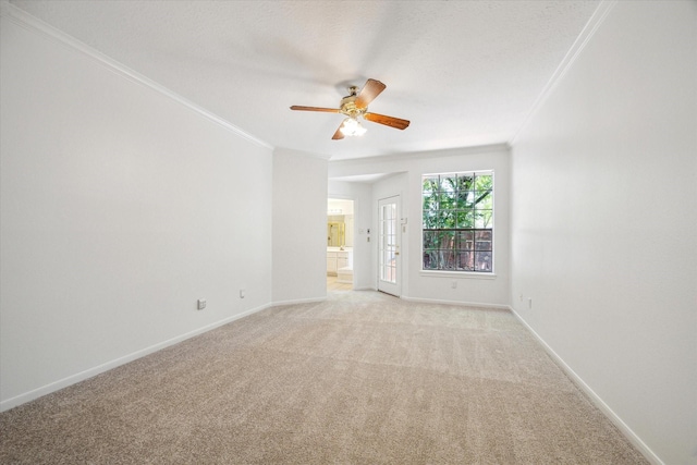 14507 Sycamore Lake Rd, Houston, TX 77062 - spare room with crown molding, ceiling fan, light carpet, and baseboards