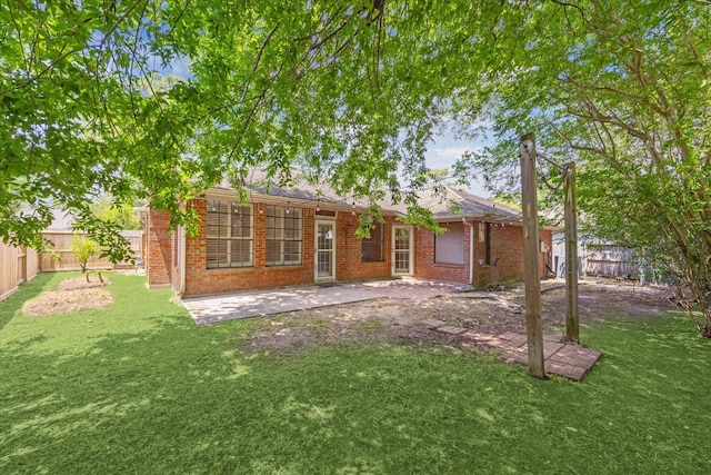 14507 Sycamore Lake Rd, Houston, TX 77062 - back of property with brick siding and a patio