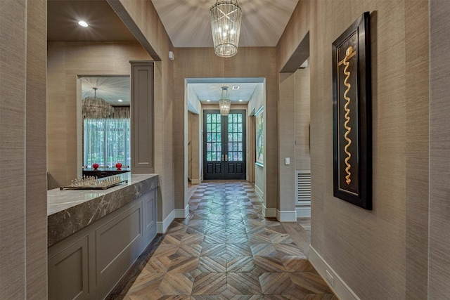 3637 Meadow Lake Ln, Houston, TX 77027 - foyer entrance featuring french doors, a chandelier, baseboards, and recessed lighting