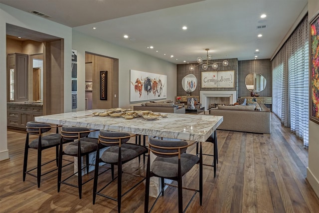 3637 Meadow Lake Ln, Houston, TX 77027 - dining area with dark wood-style floors, recessed lighting, and a chandelier