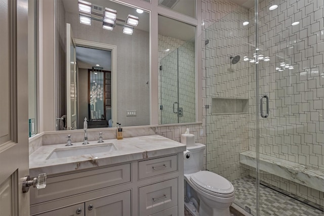 3637 Meadow Lake Ln, Houston, TX 77027 - bathroom featuring toilet, vanity, a stall shower, and tile walls