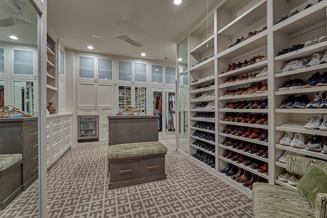 3637 Meadow Lake Ln, Houston, TX 77027 - walk in closet featuring beverage cooler and light floors