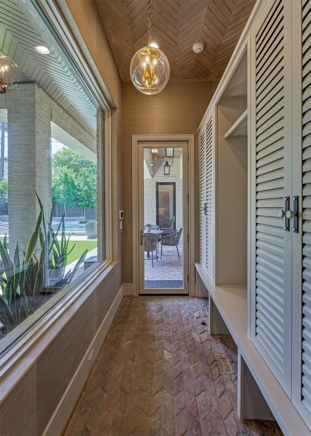 3637 Meadow Lake Ln, Houston, TX 77027 - mudroom featuring wood ceiling and brick flooring