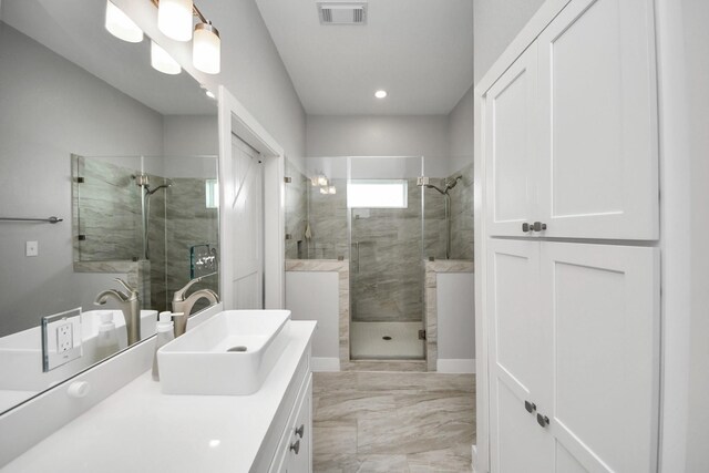1205 Todville Rd, Seabrook, TX 77586 - full bathroom with marble finish floors, a shower stall, vanity, and recessed lighting