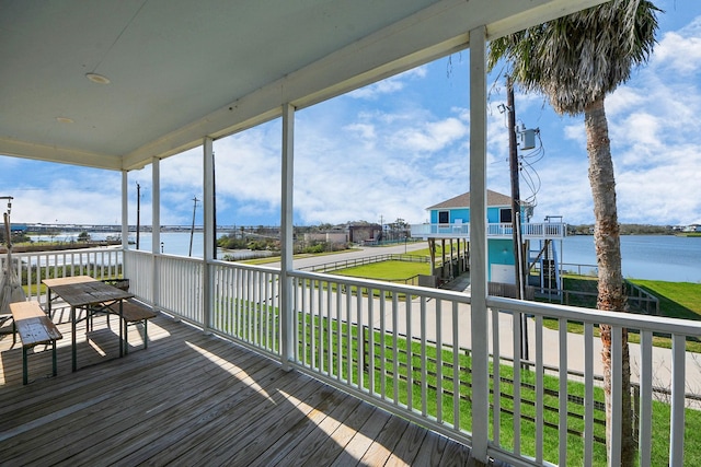 1205 Todville Rd, Seabrook, TX 77586 - wooden deck featuring a water view and a lawn