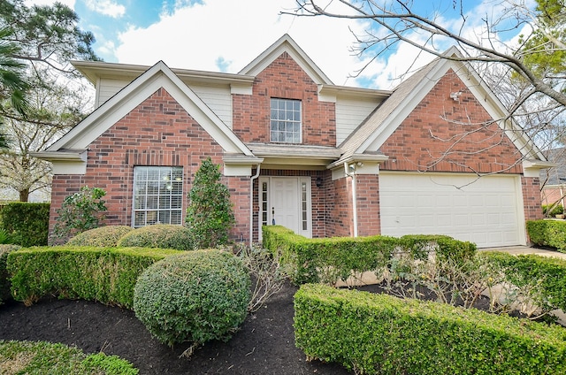 3067 Silver Cedar Trl, Katy, TX 77449 - view of front facade with brick siding and a garage