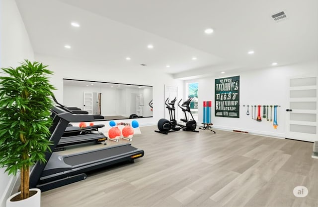 12564 Memorial Dr, Houston, TX 77024 - workout area featuring wood finished floors and recessed lighting