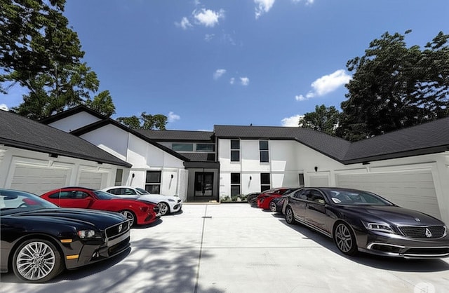 12564 Memorial Dr, Houston, TX 77024 - view of front of home featuring stucco siding