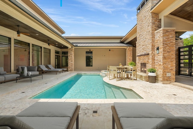 16827 Falcon Sound Dr, Montgomery, TX 77356 - view of swimming pool featuring a ceiling fan, a patio, outdoor lounge area, and a pool with connected hot tub