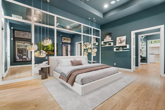 16827 Falcon Sound Dr, Montgomery, TX 77356 - bedroom featuring wood finished floors and baseboards
