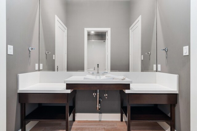 16827 Falcon Sound Dr, Montgomery, TX 77356 - full bath with wood finished floors and vanity