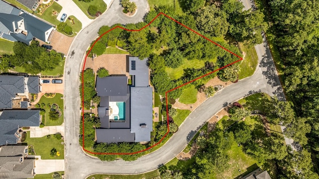 16827 Falcon Sound Dr, Montgomery, TX 77356 - aerial perspective of suburban area with property boundaries highlighted
