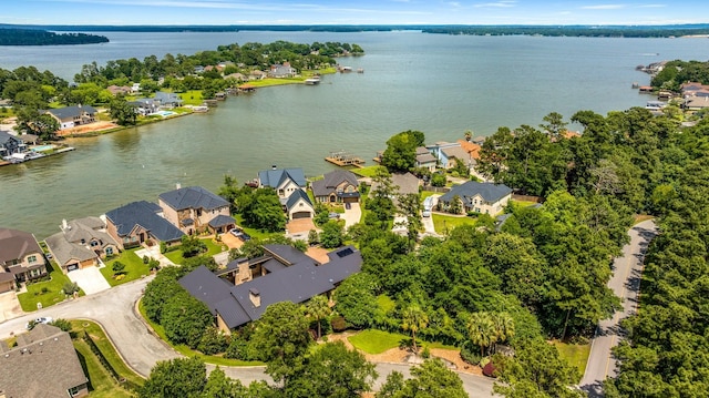 16827 Falcon Sound Dr, Montgomery, TX 77356 - aerial view of residential area featuring a nearby body of water