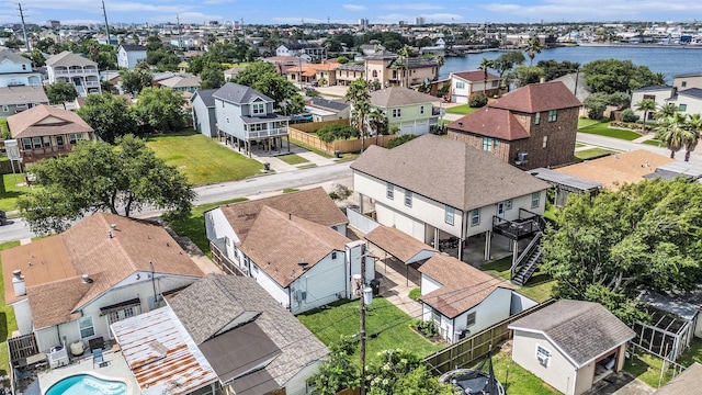 5720 Fraser Ave, Galveston, TX 77551 - aerial perspective of suburban area featuring a large body of water