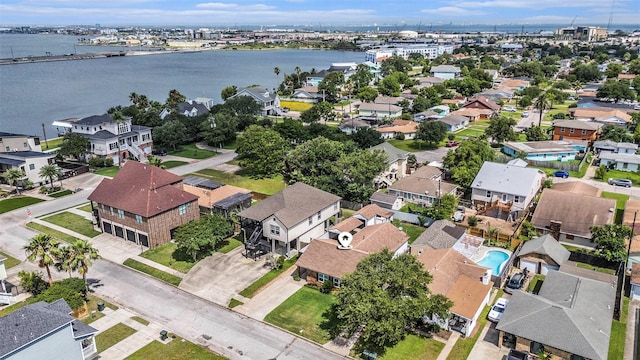 5720 Fraser Ave, Galveston, TX 77551 - aerial perspective of suburban area featuring a nearby body of water