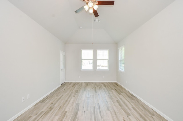 426 Sunny River Ln, Richmond, TX 77406 - empty room featuring light wood-style floors, a ceiling fan, lofted ceiling, and baseboards