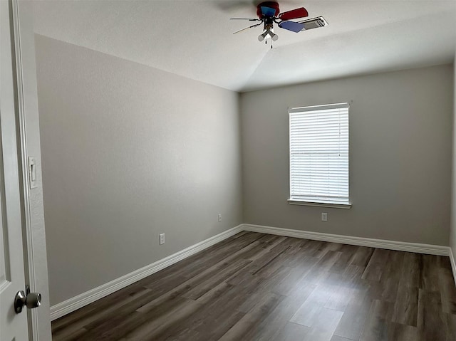15318 Griggs Point Ln, Sugar Land, TX 77498 - empty room with dark wood finished floors, ceiling fan, and baseboards
