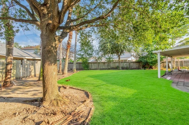 15318 Griggs Point Ln, Sugar Land, TX 77498 - view of yard featuring a patio
