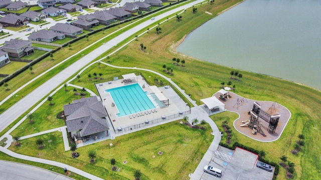 4710 Jasmine Heather Ln, Baytown, TX 77521 - drone / aerial view of a pool and a nearby body of water