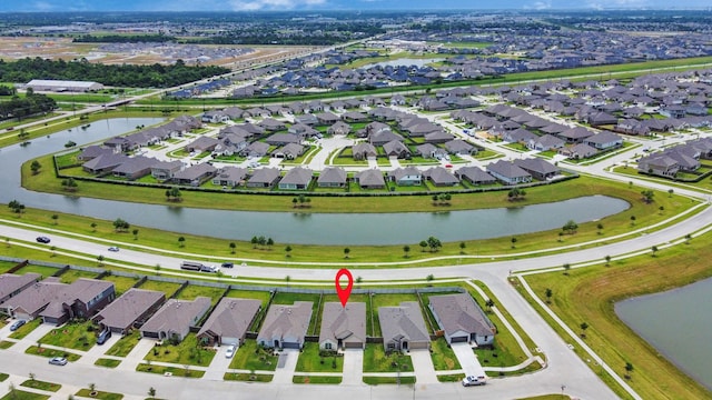 4710 Jasmine Heather Ln, Baytown, TX 77521 - aerial view of property and surrounding area with a large body of water and nearby suburban area