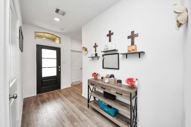 4710 Jasmine Heather Ln, Baytown, TX 77521 - entryway featuring light wood-type flooring and baseboards