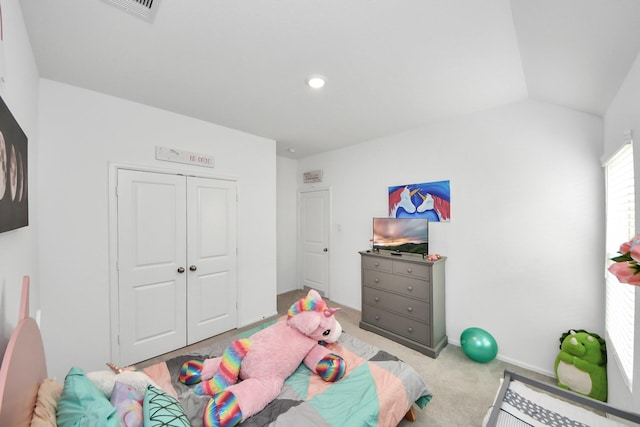 4710 Jasmine Heather Ln, Baytown, TX 77521 - bedroom featuring carpet floors, a closet, and lofted ceiling