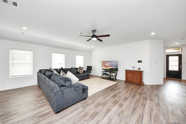 4710 Jasmine Heather Ln, Baytown, TX 77521 - living area featuring healthy amount of natural light, wood finished floors, a ceiling fan, and recessed lighting