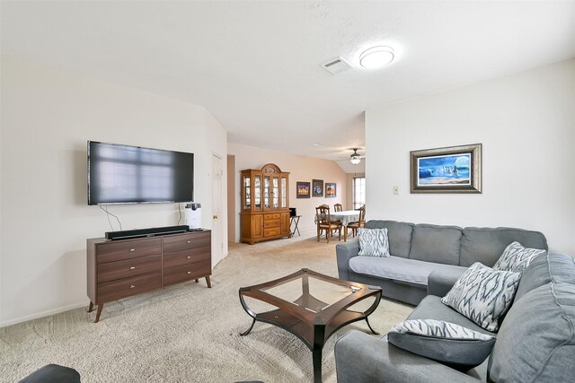 6511 Coldstream Dr, Pasadena, TX 77505 - living area with light colored carpet and a ceiling fan