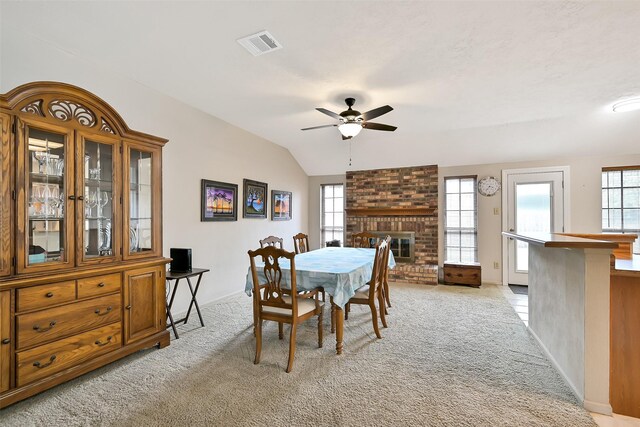 6511 Coldstream Dr, Pasadena, TX 77505 - dining area featuring light carpet, plenty of natural light, ceiling fan, and lofted ceiling