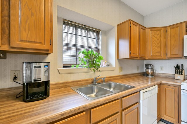 6511 Coldstream Dr, Pasadena, TX 77505 - kitchen featuring white appliances, a sink, wallpapered walls, and wood counters