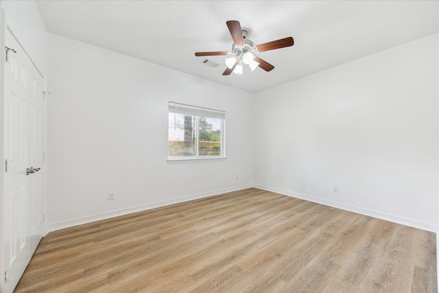 22313 Baneberry Rd, Magnolia, TX 77355 - unfurnished room with light wood-type flooring, ceiling fan, and baseboards
