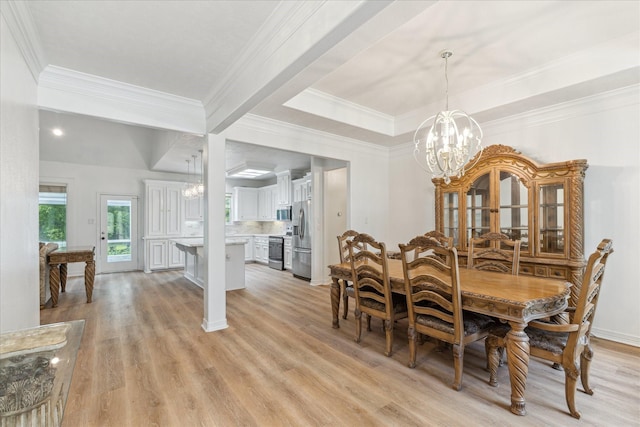22313 Baneberry Rd, Magnolia, TX 77355 - dining area with a chandelier, ornamental molding, and light wood-style floors