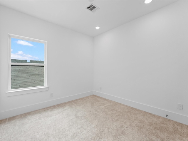 867 Mansfield St Unit E, Houston, TX 77091 - carpeted spare room with baseboards and recessed lighting