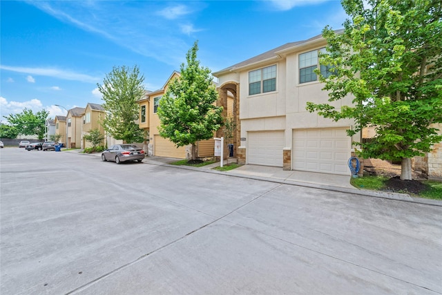 12627 Ashford Shore Dr, Houston, TX 77072 - view of property featuring stucco siding, stone siding, and a residential view